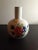 This is a Handpainted Porcelain 7" Vase by Bresolin, Italy. Procured at auction BOX 22