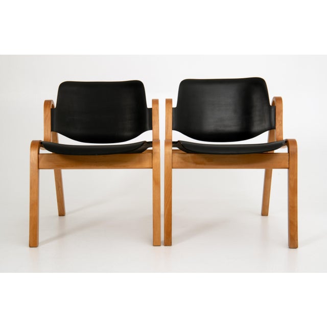 A pair of "Wilhelmina" chairs designed by Finnish designer llmari Tapiovaara for Laukkanpuu in the 1950's. The chairs are...