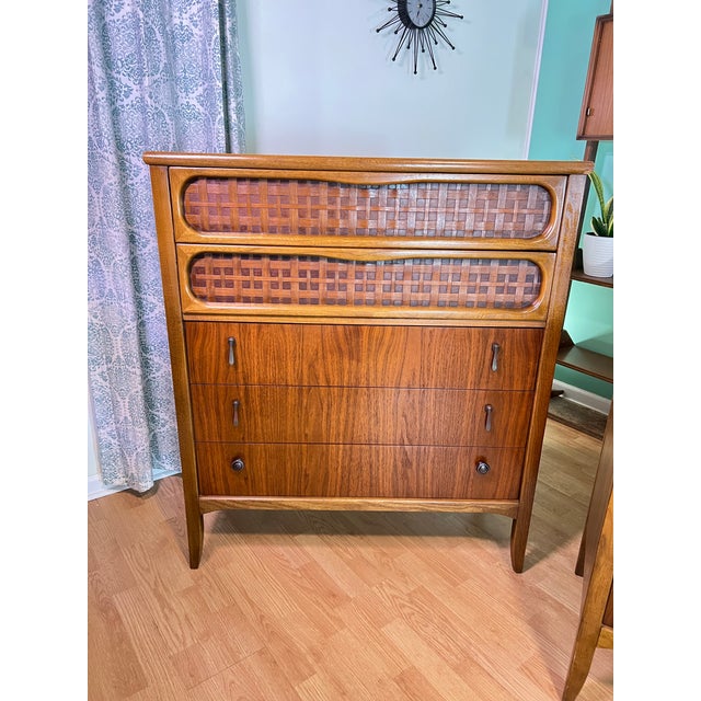 Gorgeous Lane Perception series mcm highboy dresser. This iconic piece features the signature woven basketweave panels on...