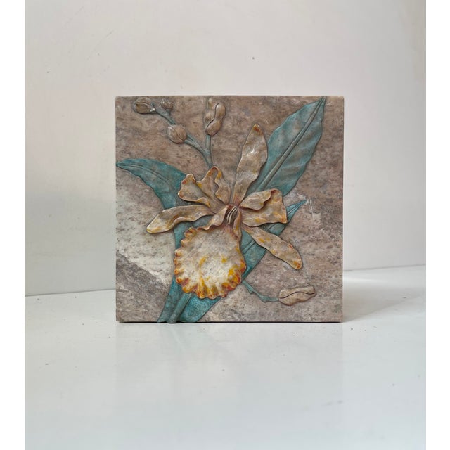 A fine and skillfully crafted stone trinket fashioned from slaps of solid marble. The lid is cut in relief with a delicate...