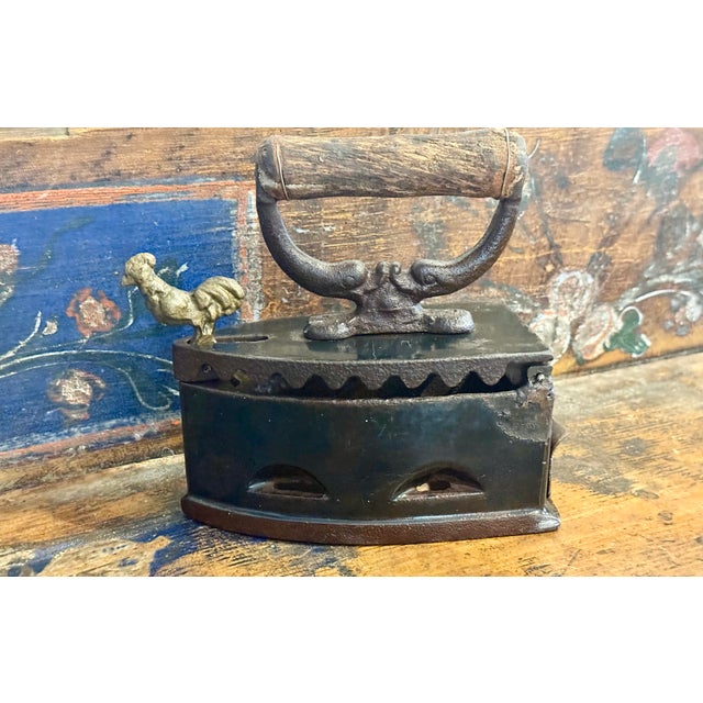 Antique Cast Iron, Enamel Coated Charcoal Box Iron Featuring a Wooden Handle & a Distinctive Brass Rooster-Shaped Latch....