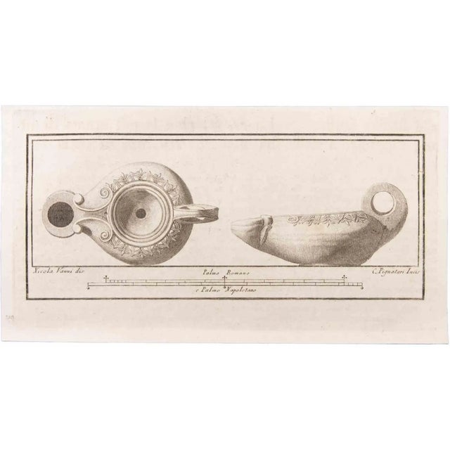 Oil lamp with decoration is an etching realized by carlo pignatari (18th century). The etching belongs to the print suite...
