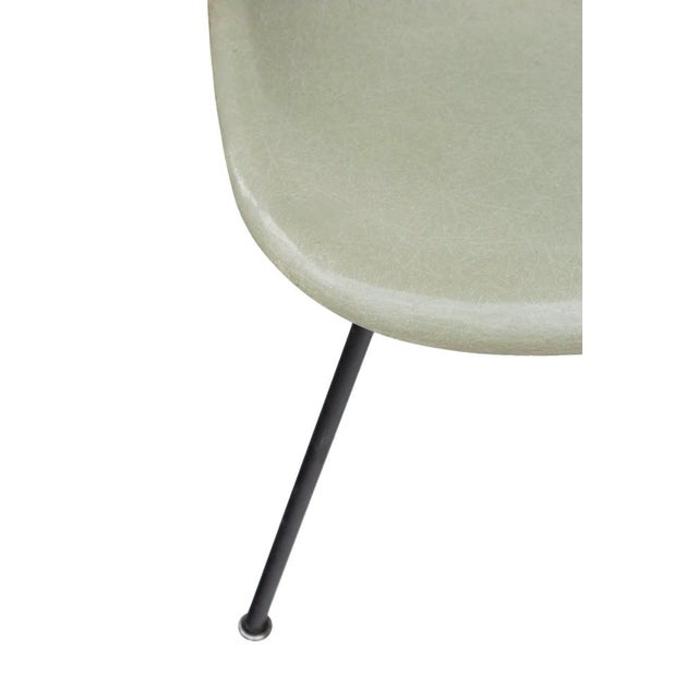 USA, 1950s Herman Miller Eames Side Shell Chair in Seafoam Light on original black H base. Chair looks to have had a...