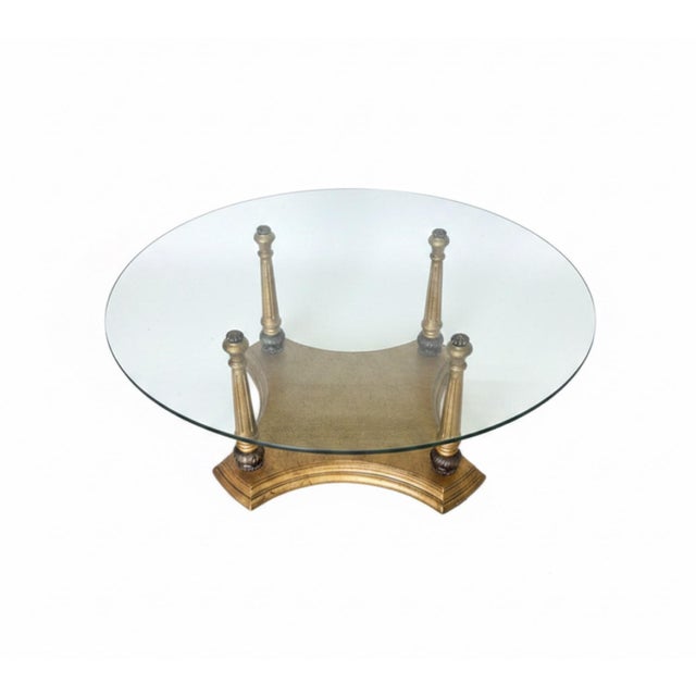 An exquisite mid-century Hollywood Regency cocktail table attributed to the Spanish designs of Francisco Hurtado....