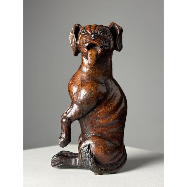 18th century hand-carved solid wooden dog after the story of Saint Rocco from Venice. The object is in overall beautiful...