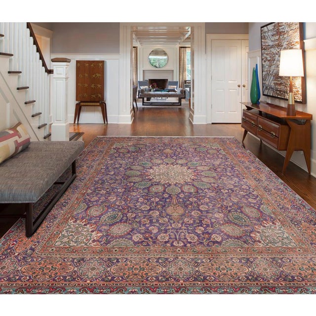 Enhance your living space with this stunning vintage Persian hand-knotted wool rug, a true showstopper that effortlessly...