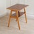 A two-tiered side table, made in Germany in the 1960s, originating from the Dresden area. The angled, tapered legs and the...