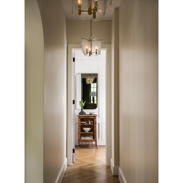Modern and elegant, panes of striking water glass adorn the Echo Pendant to create a dynamic lighting piece. Each glass...