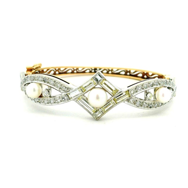 A beautifully composed mid-century French bracelet that balances structure with softness. Crafted in 14K yellow gold with...