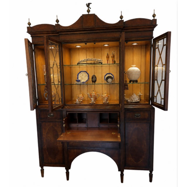 Impressive Lillian August mahogany secretary and display cabinet combining substantial architectural presence with...