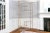 A majestic hammered wrought iron etagere with a beautiful gilt finish and eight 1/4” thick glass shelves. This high...