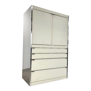 1970s Post Modern Ivory Glass and Mirrored Stainless Steel Armoire Dresser Attributed to Designer o.b. Solie for Ello Furniture For Sale