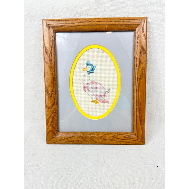 Vintage hand cross stitched Beatrix Potter piece. Framed with new matting and back paper and wire. From the story of...