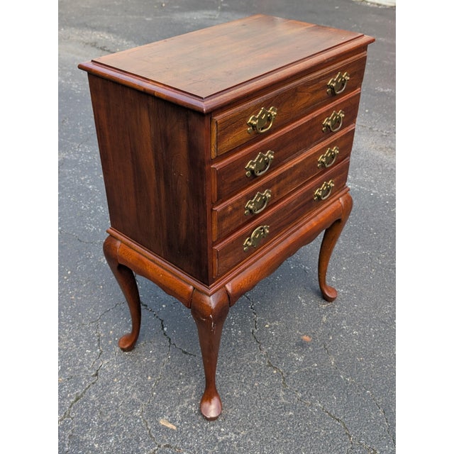 Timeless elegance meets practical luxury in this Vintage Solid Cherry Queen Anne Style Silverware Chest. Crafted from...