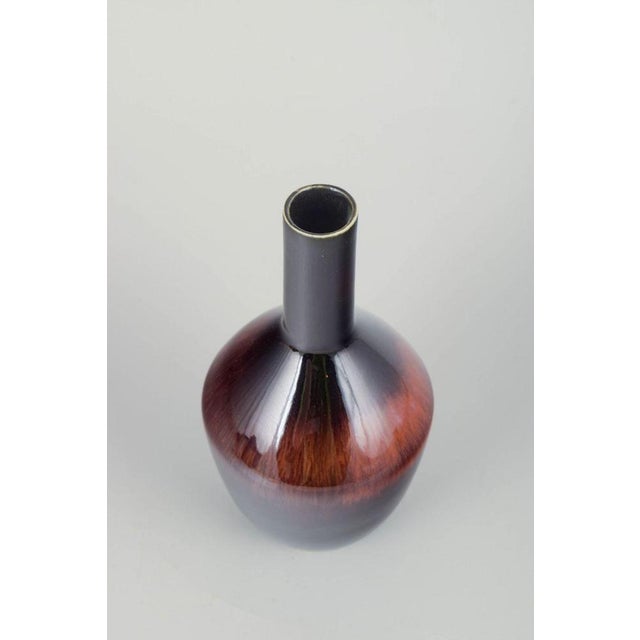 Carl-Harry Stålhane for Rörstrand Elegant vase, mid-20th century. Slender cylindrical neck and rounded body with deep two-...