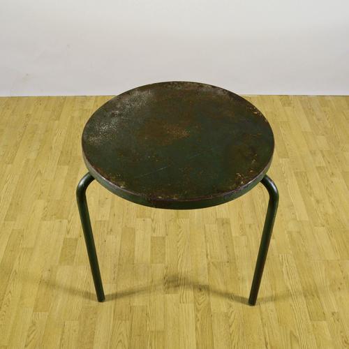 This vintage coffee table embodies the essence of 1950s industrial design, a period characterized by solid materials and...