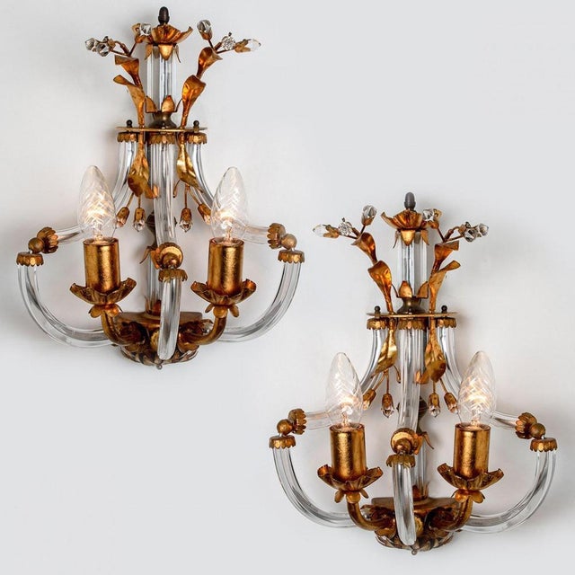 Elegant crystal glass and brass wall lights by Palwa, Germany. Wonderful light effect due to lovely glass elements....