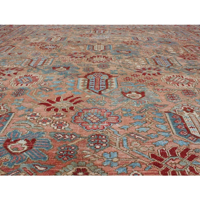 Textile Antique Persian Bakhtiari Rug Featuring Repeating Floral Motifs and Rich Red 10 X 12 For Sale - Image 7 of 12
