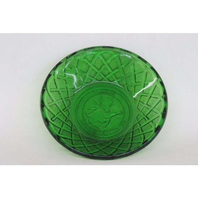 This beautiful Astrology Themed Dish is made of glass. This gorgeous dish presents a stunning vibrant green color...
