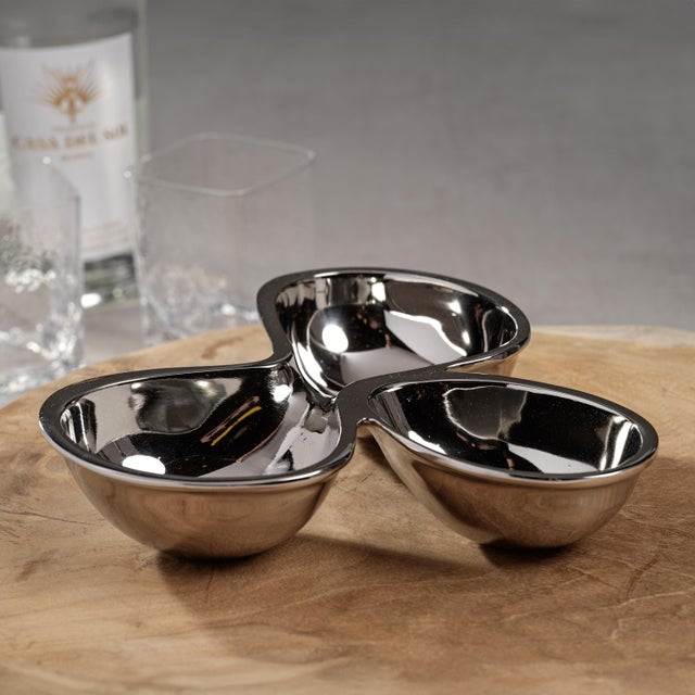 Upgrade your table with our timeless form and polished aluminum condiment set that features 3 perfectly sized bowls. This...
