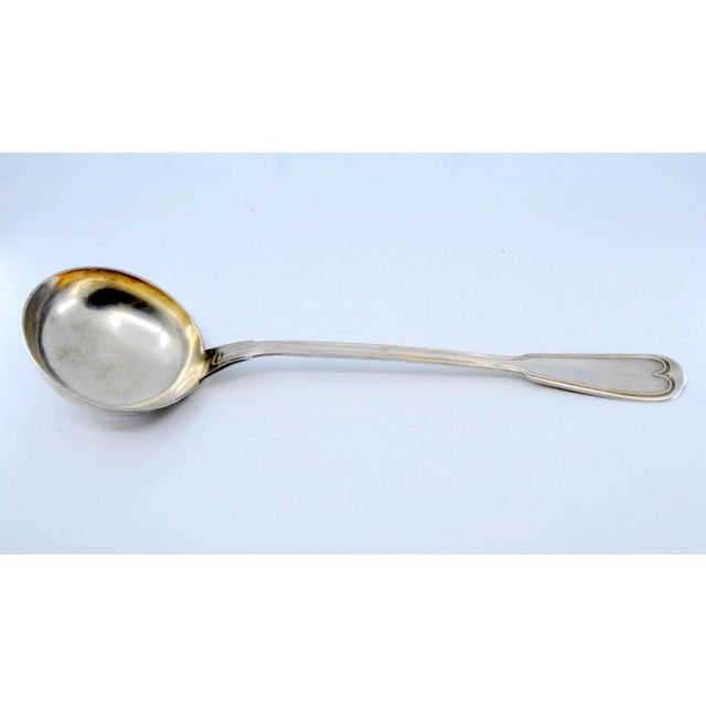Silver Soup Ladle with a Strip Along the Handle, in Very Good conditions. Designed before 1890 This piece has an...