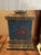 Striking pair of vintage Chinoiserie-inspired table lamps featuring deep teal-blue panels decorated with hand-painted-...