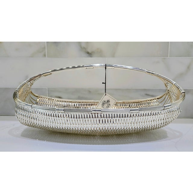 Elevate any surface with this Christofle Paris silver-plated woven basket, handwoven in France using traditional artisan...