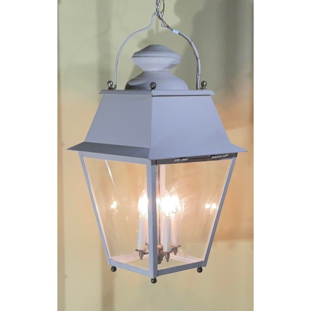 Elegant large hanging lantern handcrafted from solid brass, clear glass ,hand painted on brass. With four 40/watt lights,...