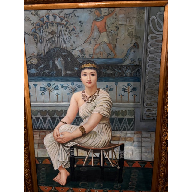Description A striking large-scale Egyptmn Revival portrait painting depicting an elegantly dressed seated woman against...