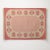 Mid-Century Swedish kilim in tones of pink and cream with a central plain area circled with medallions. Professionally...