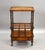 A fine quality Victorian burr walnut Canterbury, raised on original turned supports with a shaped upper tier and...