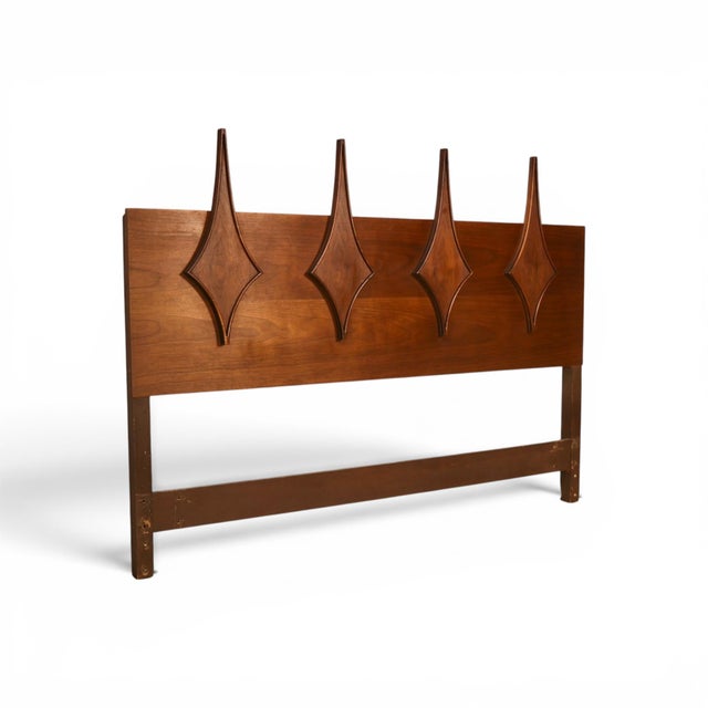 This 1960s Specialty Woodcraft queen headboard is an eclectic, seldom seen design that turns the maker's sculpted diamond...