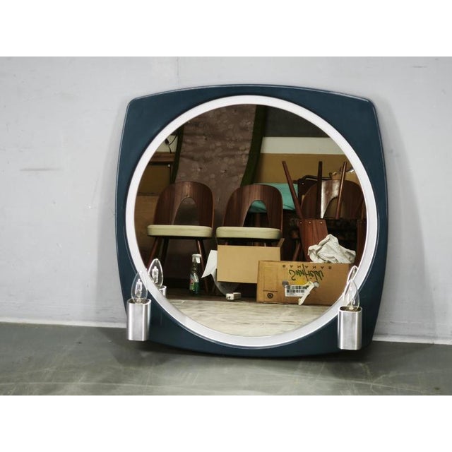 Sculptural space age illuminated mirror by thema, produced in italy during the 1970s. This distinctive vintage italian...