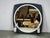 Sculptural space age illuminated mirror by thema, produced in italy during the 1970s. This distinctive vintage italian...