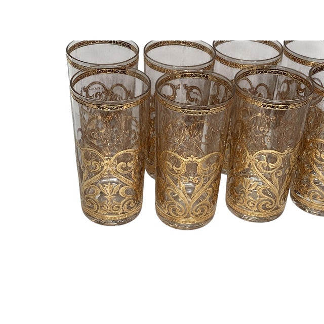 A set eight Culver highball water or cocktail glasses in the Spanish scroll pattern. Beautifuly decorated in 22k gold.