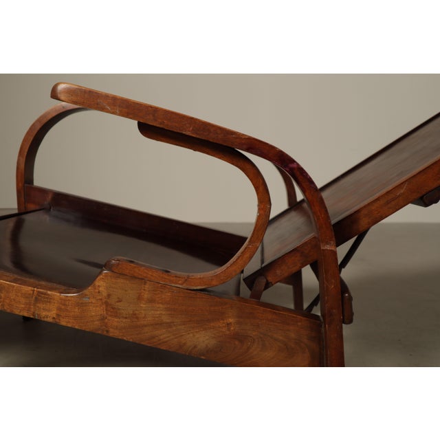 Rare adjustable lounge chair manufactured by Móveis Gerdau in Porto Alegre, Brazil, circa 1950. The chair is constructed...