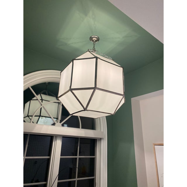 This polished nickel and white glass Visual Comfort Morris large lantern is virtually new. It was purchased, hung, judged...