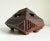 Exceptional tramp art box with dramatic pyramid shape atop four tapered feet. Handmade in the early 1900s using recycled...