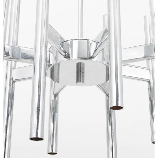 Gaetano Sciolari Italian Modernist Chrome Pendant Lamp, with sixteen light bulb fittings, two per arm.