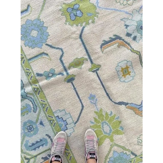 Shades of Blue & Green & Goldenrod handknotted modern oushak rug As all of our rugs are made by hand, each may have slight...