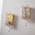 Glass and brass wall lamp from the 1960s by Doria Leuchten. Thanks to its glass lampshades, it gives off a cosy glow,...