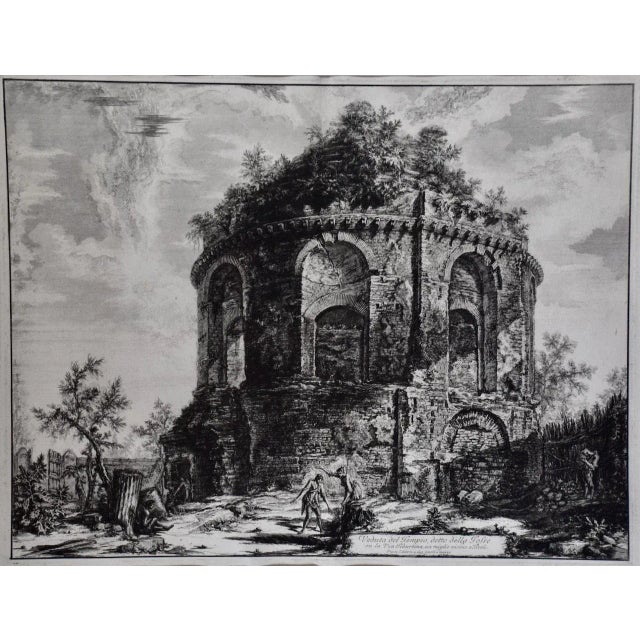 This is an 18th century etching by Giovanni Battista Piranesi entitled "Veduta del Tempio detto della Tosse su la Via...