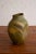 Royal Haeger organic free form vase from the "Earth Wrap" series. Green base coat with abstract textured yellow and brown...