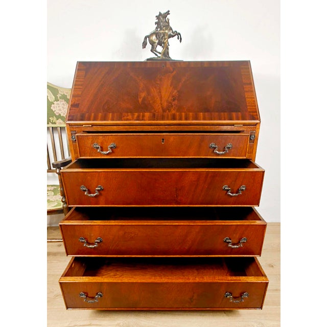 This beautiful vintage writing bureau desk would make for a wonderful addition to a mid 20th century living room or home...