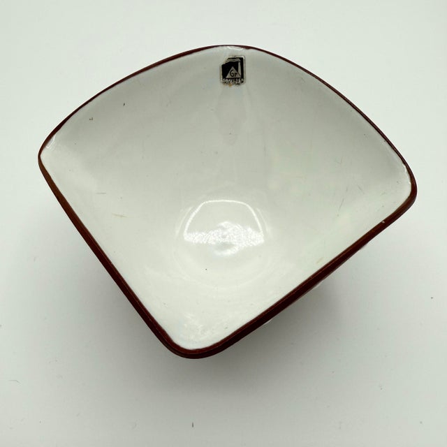 A charming mid-century Scandinavian studio ceramic bowl marked Made in Norway, featuring an organic free-form rim and...