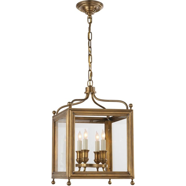 Greggory Small Lantern in Hand-Rubbed Antique Brass Designer: J. Randall Powers Canopy: 5.75" Round Mounting: Chain Shade...