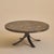 A French Brutalist round coffee table from the 1970s. The circular top is composed of laid slate tiles arranged in a...