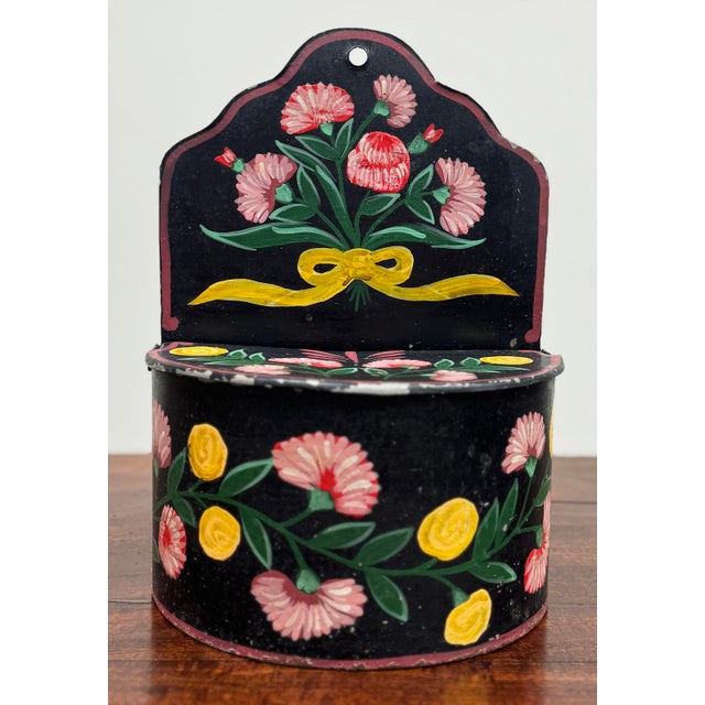 Charming farmhouse style tole hand painted metal wall pocket. Black background with pink and yellow flowers on green...