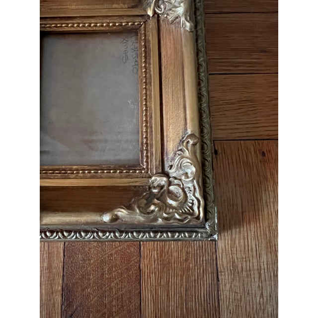 Small but elaborate gold picture frame ideal for small canvas or paper artworks. Frame size 7,25" X 6,25". Purchased at an...