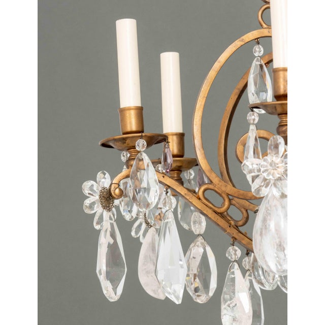 Maria Theresa Style Eight-Branch Gilt Bronze and Rock Crystal Chandelier. 44.5" H x 26.5" Diameter. Provenance: From a...